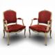 Paire de fauteuils cabriolets rouges de style Louis XV
