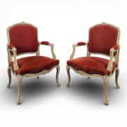 Pair of red cabriolet armchairs in Louis XV style