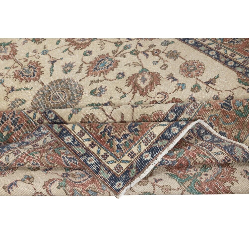 Authentic Vintage Turkish Beige Wool Area Rug with Floral Design. Hand-knotted in Turkey