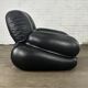 Okay armchair by Adriano Piazzesi in black leather with ottoman