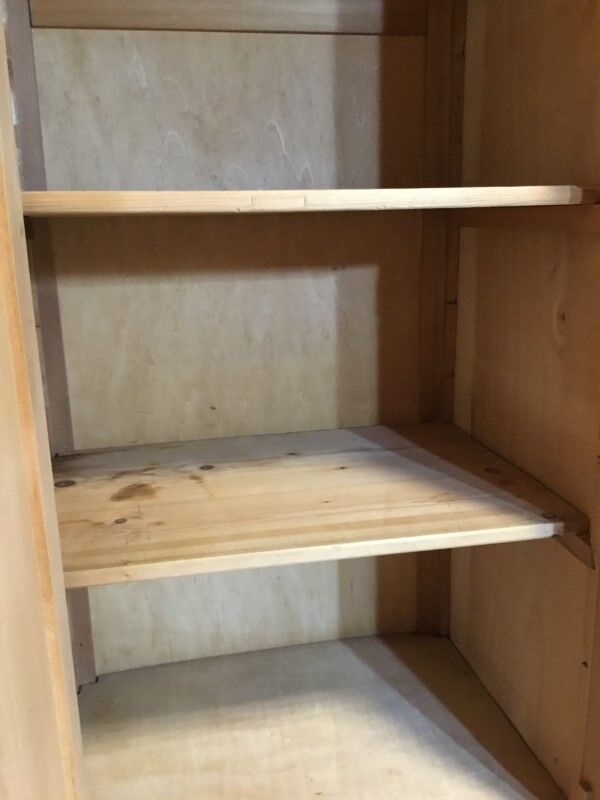 Raw wood hotel cabinet