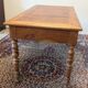 Cherry wood desk with a leather top.