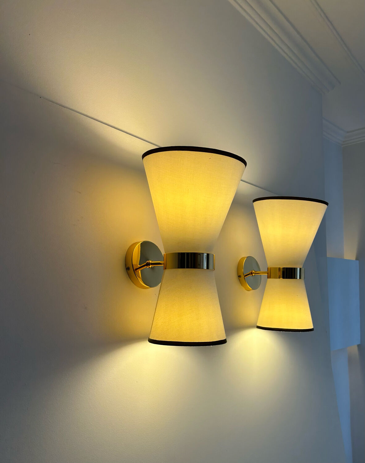 Pair of vintage wall lamps, brass and unbleached fabric, Italy 1980
