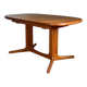 Vintage oval teak Scandinavian table with a central star base from Glostrup.