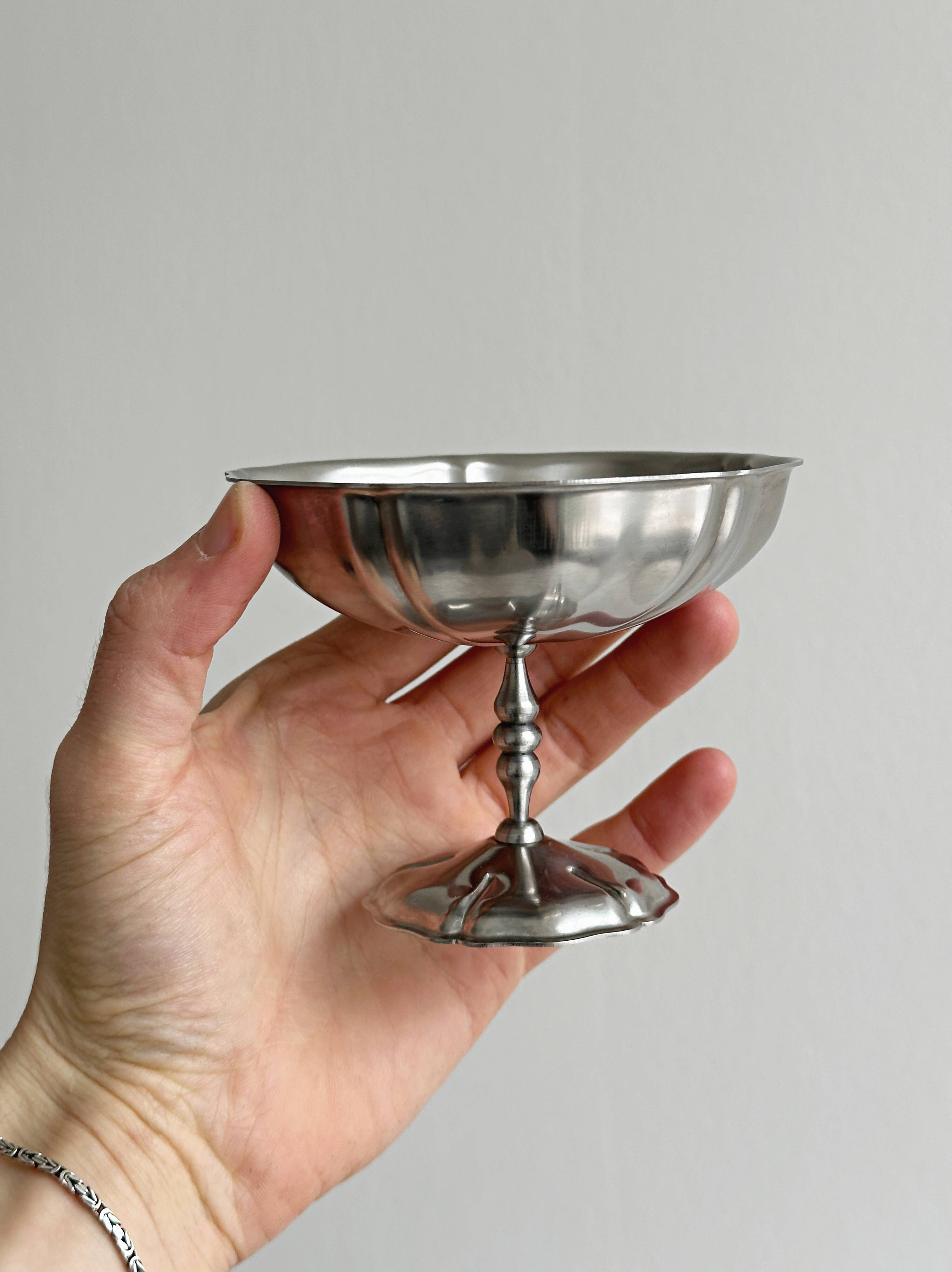 8 very large stainless steel footed bowls