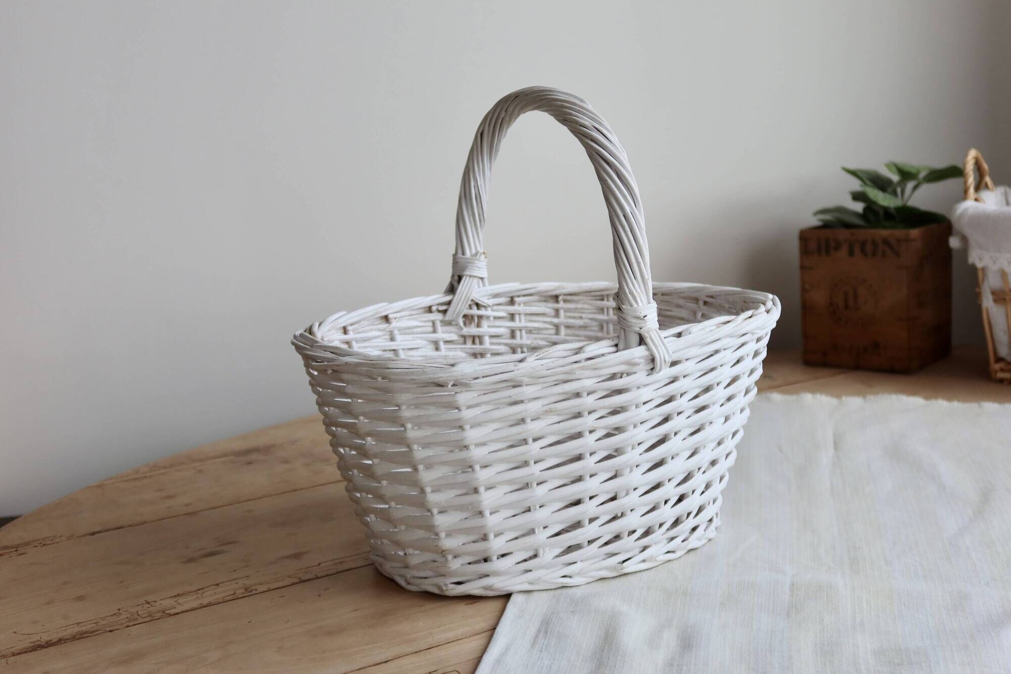 Vintage wicker basket painted white