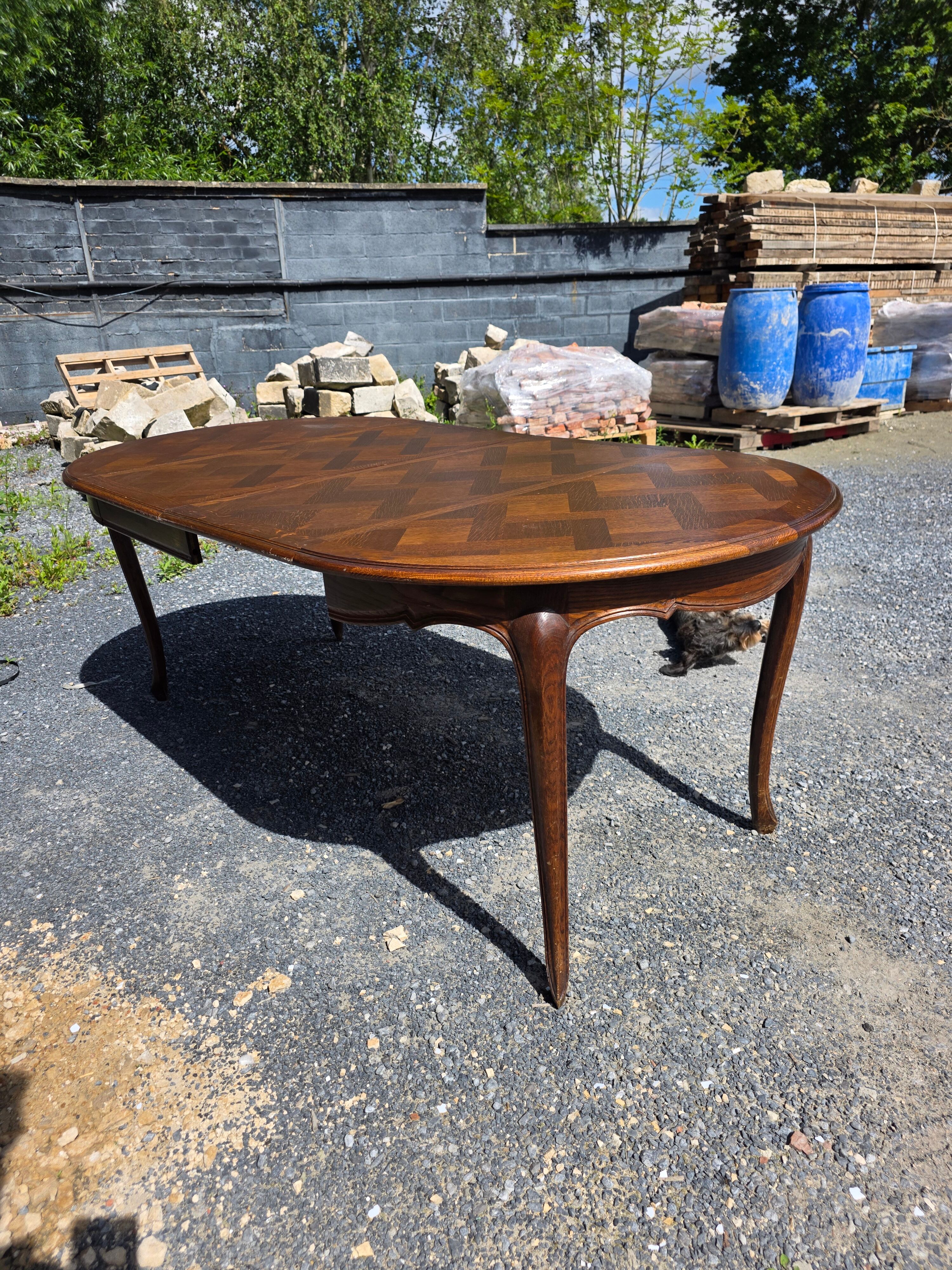 Extendable table in Louis XV style in oak (2 extensions)