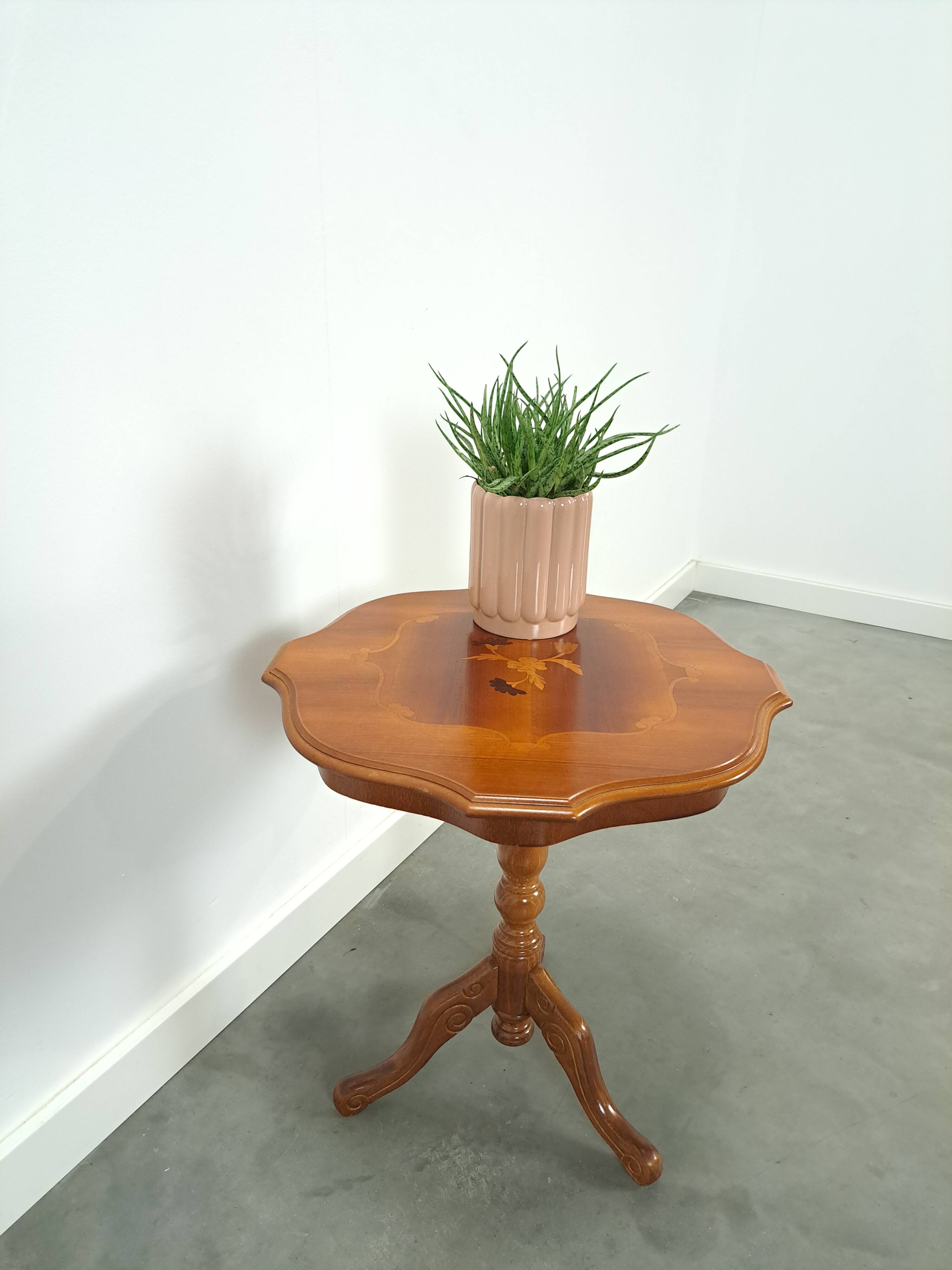 Round vintage wooden side table with inlaid veneer