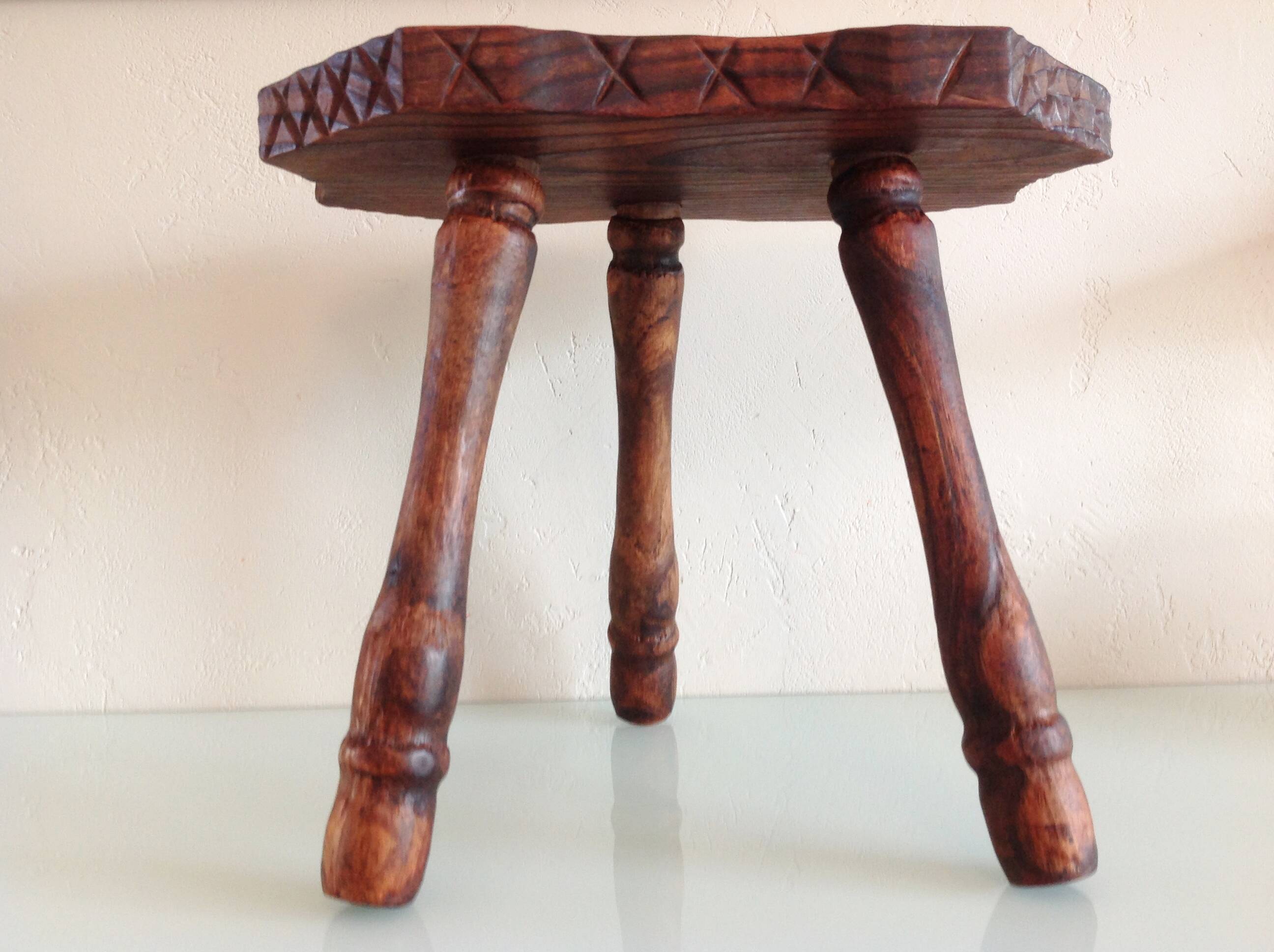 Vintage brutalist wooden tripod stool from the 60s and 70s