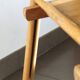 Pair of vintage wooden folding chairs with star pattern on seat