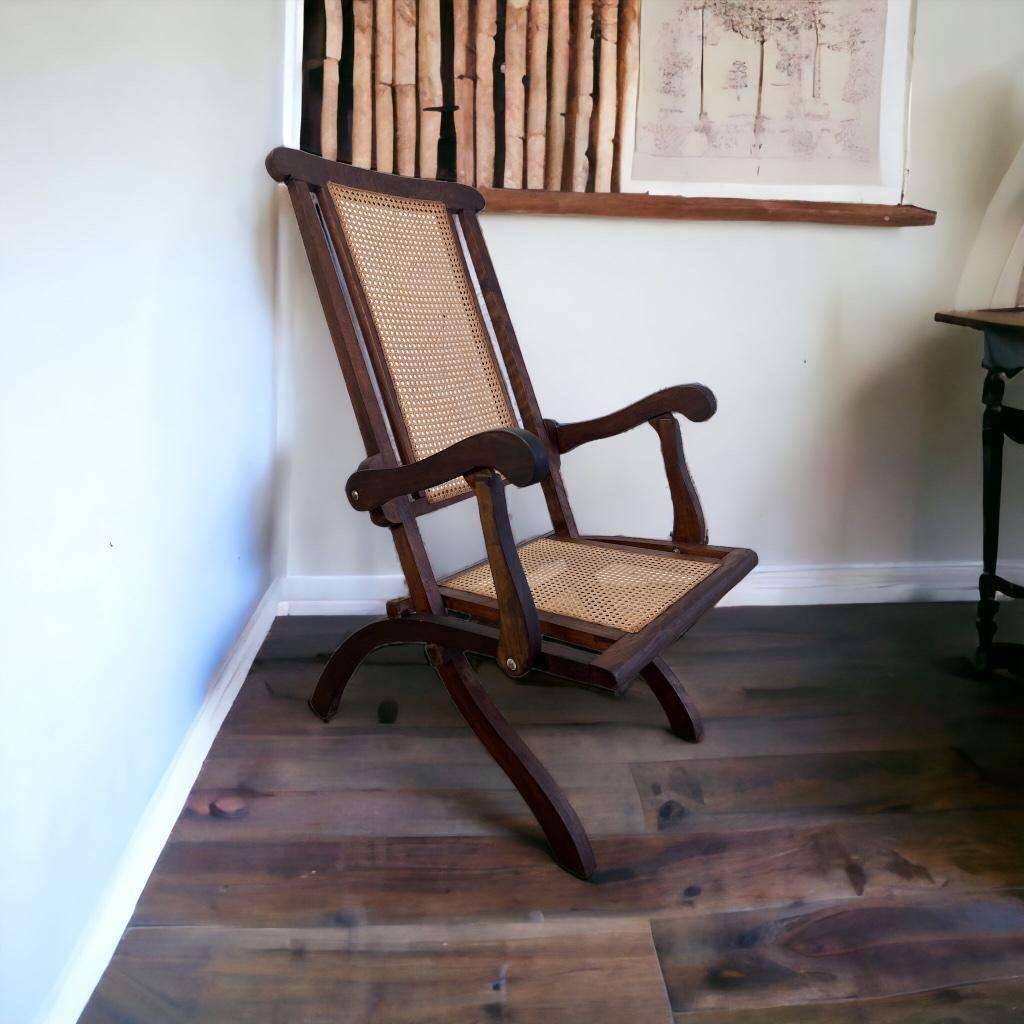Antique folding chair with weaved seat/back