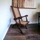 Antique folding chair with weaved seat/back