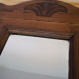 Old pediment mirror carved in wood