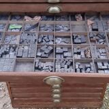 Printing cabinet 16 drawers with these lead letters