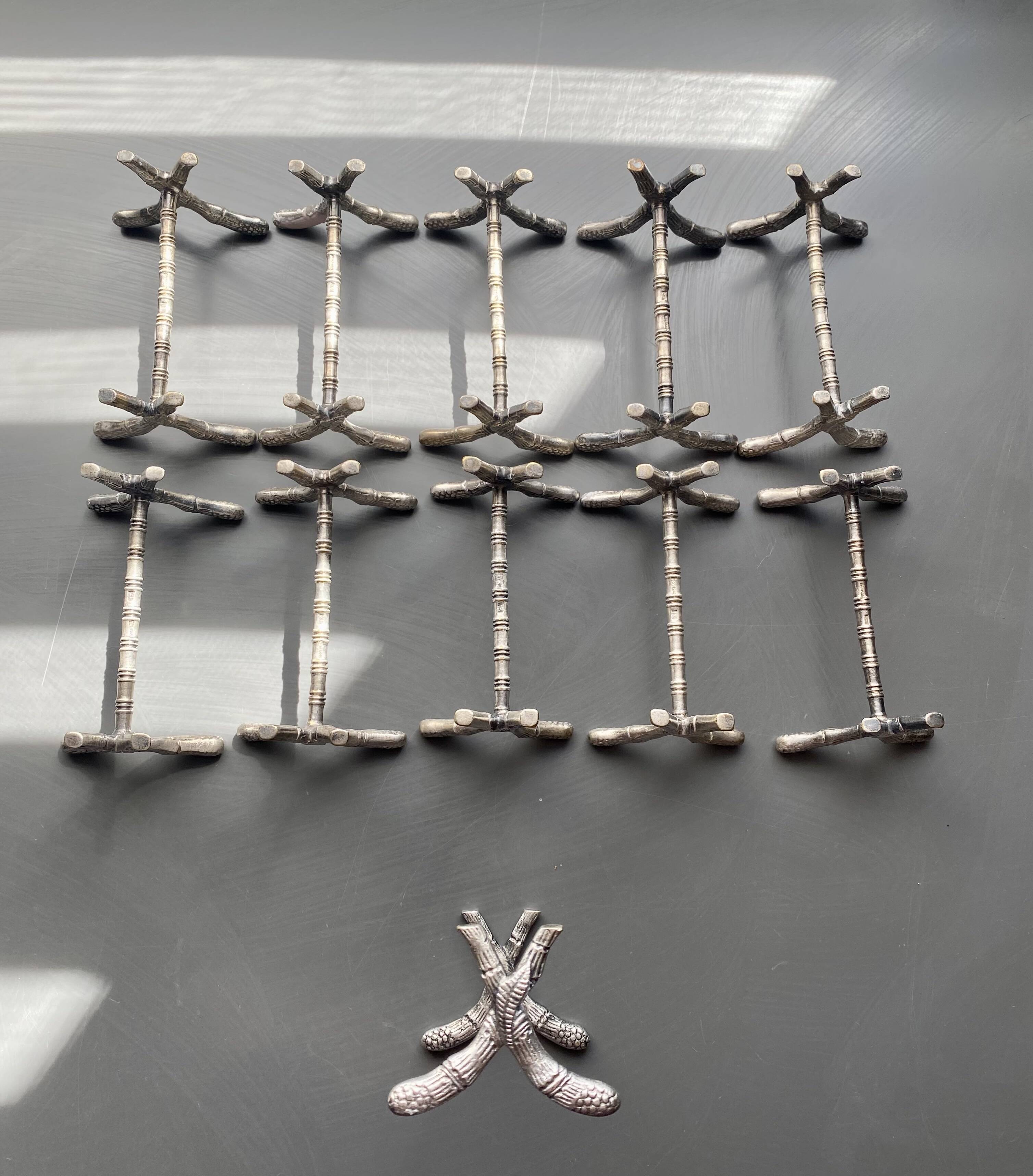11 silver-plated metal knife rests, Art Nouveau, Morlot