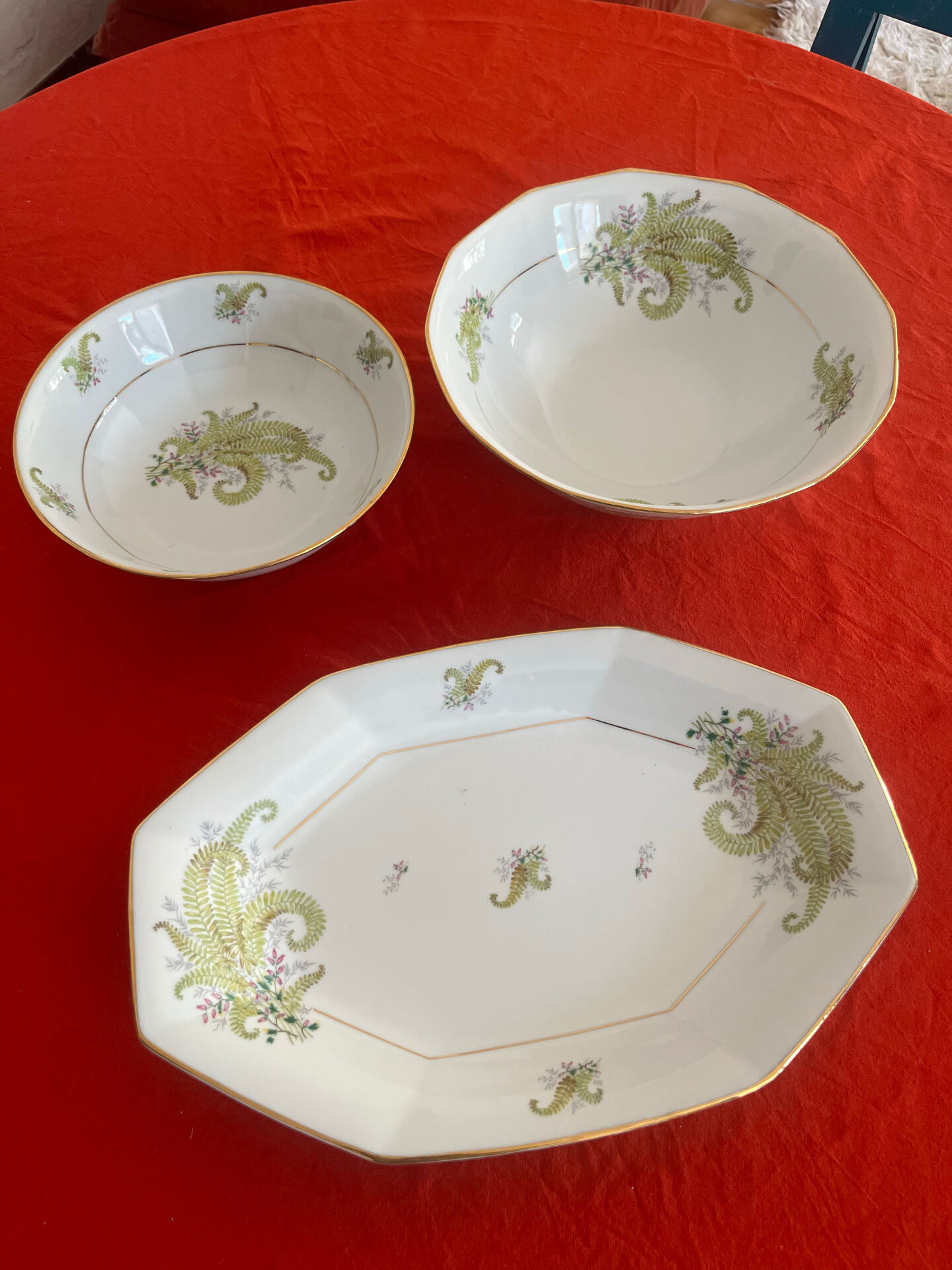 3 Limoges porcelain plates with a squirrel design.