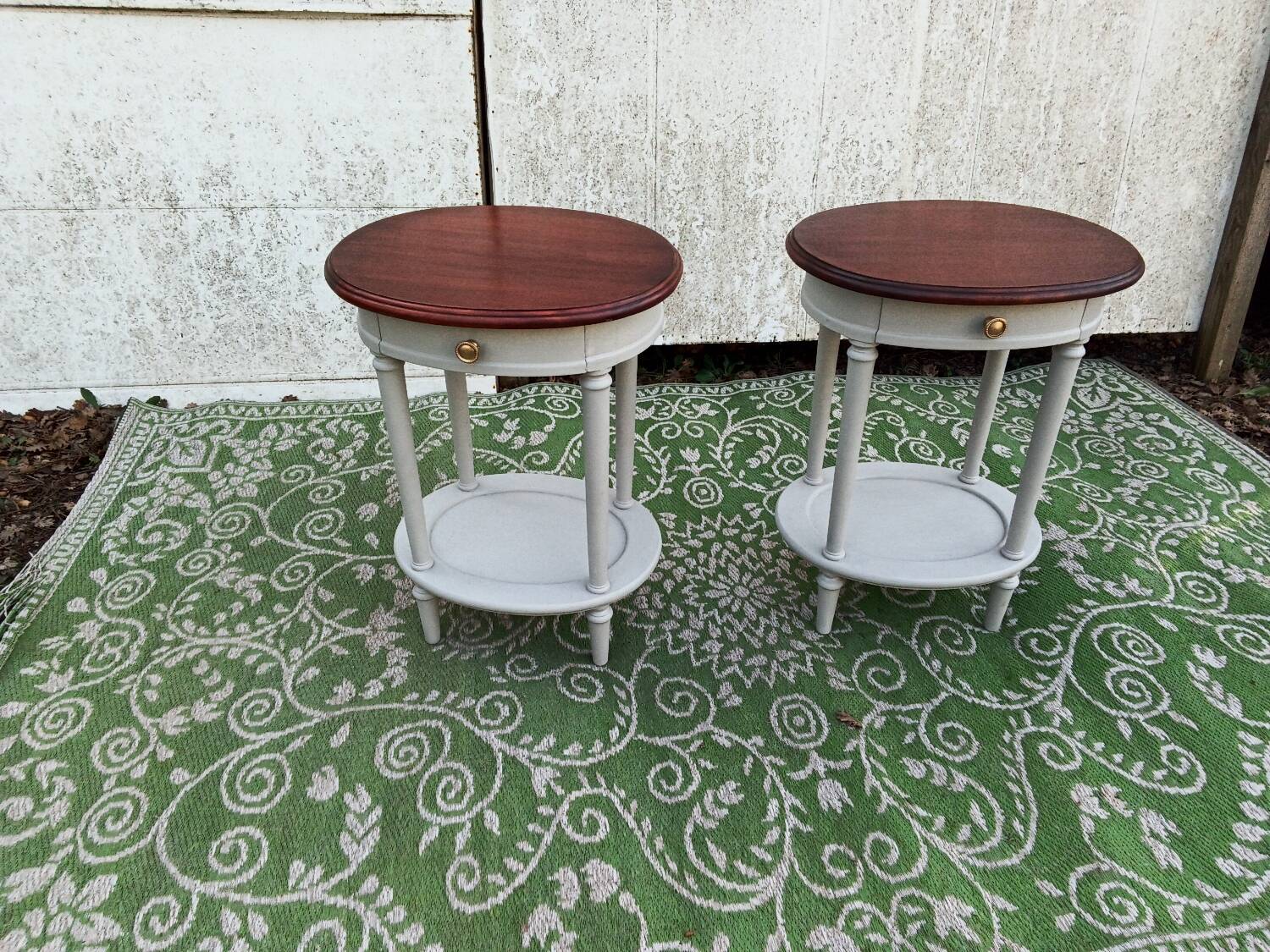 Pair of oval bedside tables