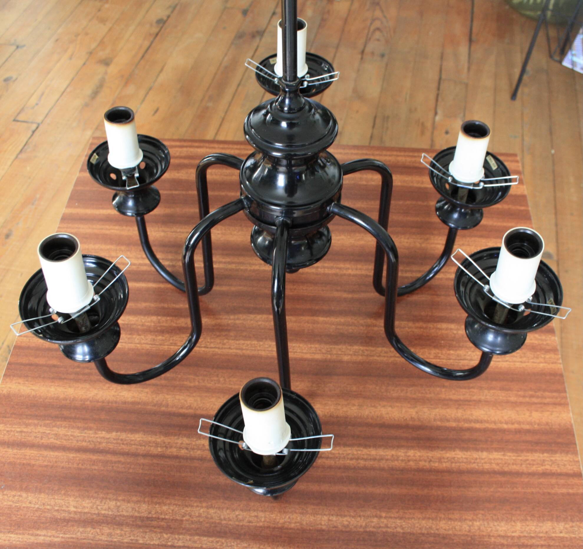 Metal chandelier and glass globes