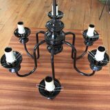 Metal chandelier and glass globes