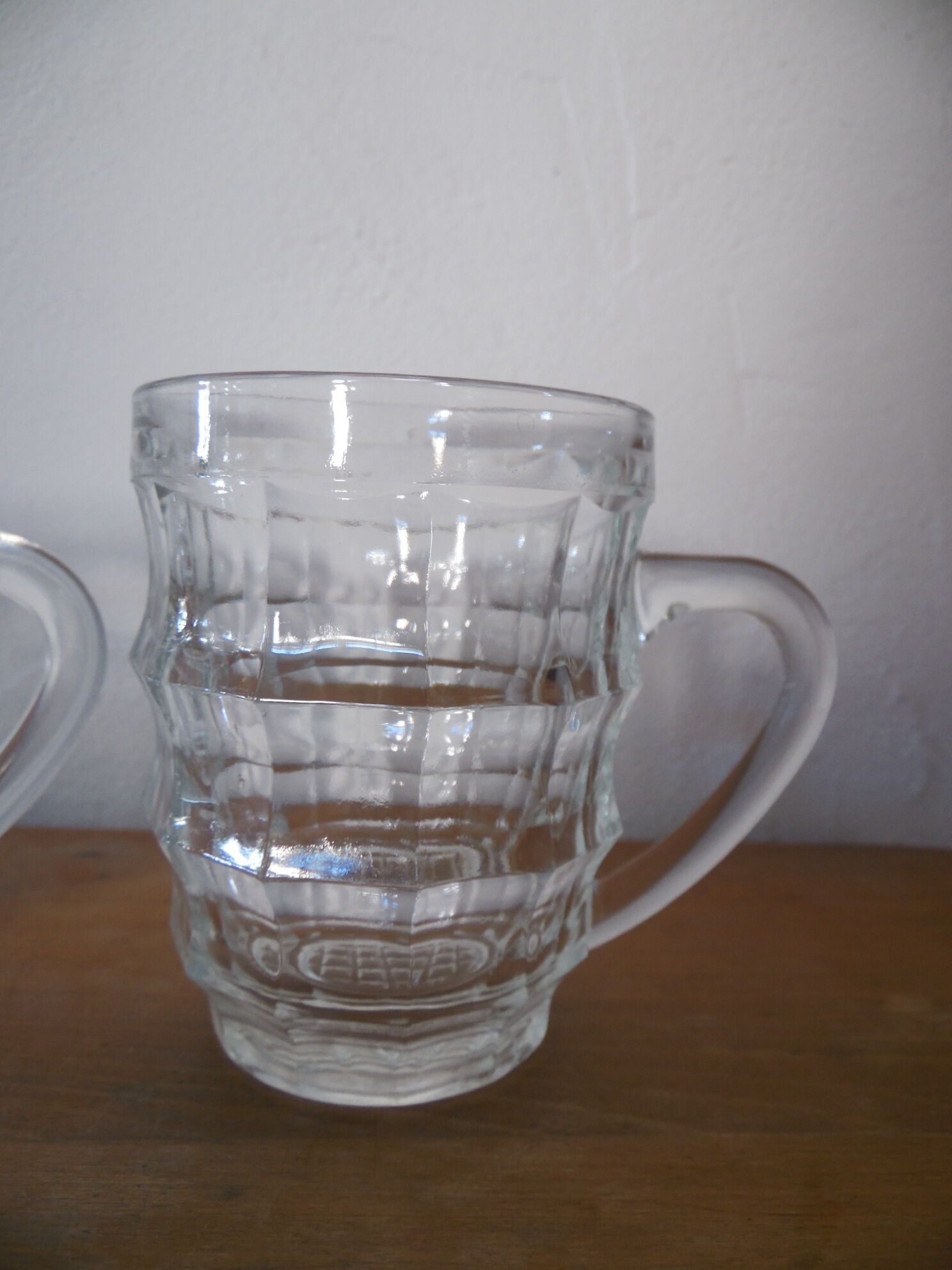 4 transparent glass mugs