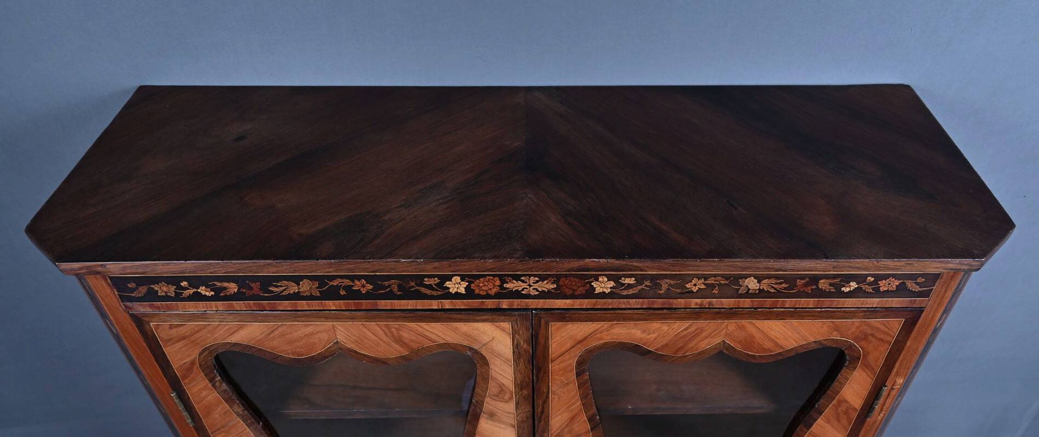 Showcase in precious wood marquetry, Louis XV Transition style.