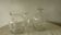 Glassware, including a jug and engraved crystal carafe.