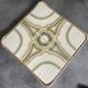 Ceramic tile trivet with vintage pattern woven wicker outline