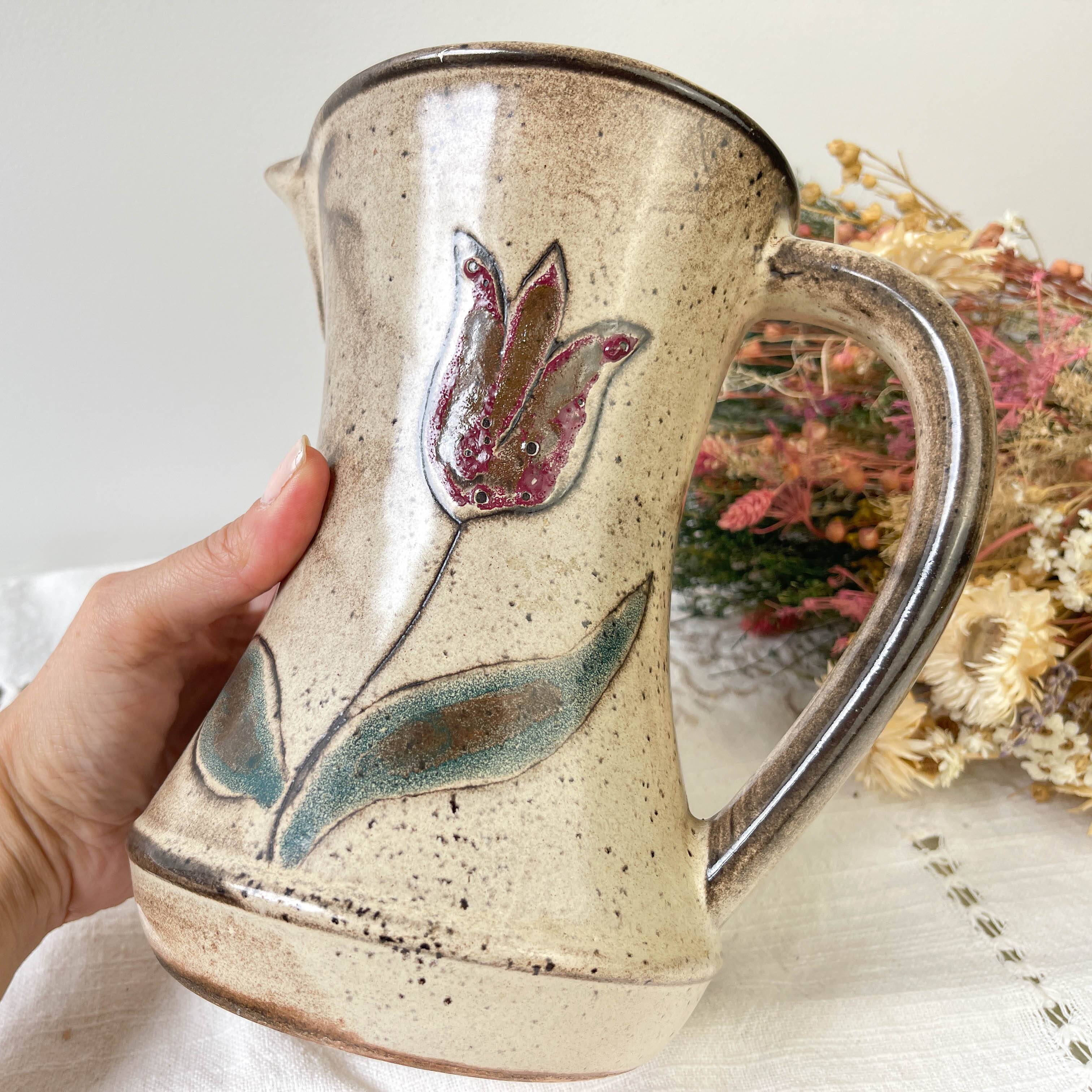 Ceramic pitcher from Les grottes dieulefit with floral pattern from the 1970s
