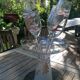 Set of 4 painted blown glass champagne flutes. Signed Denis.