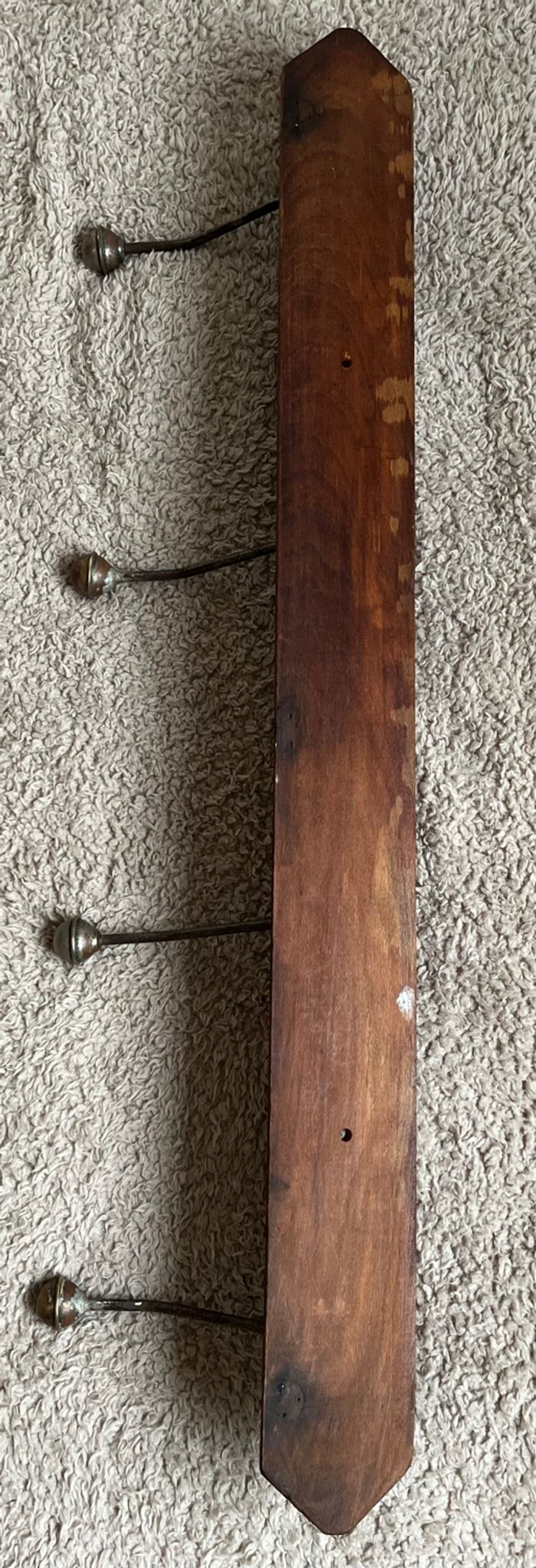 Old coat rack with metal/brass hooks