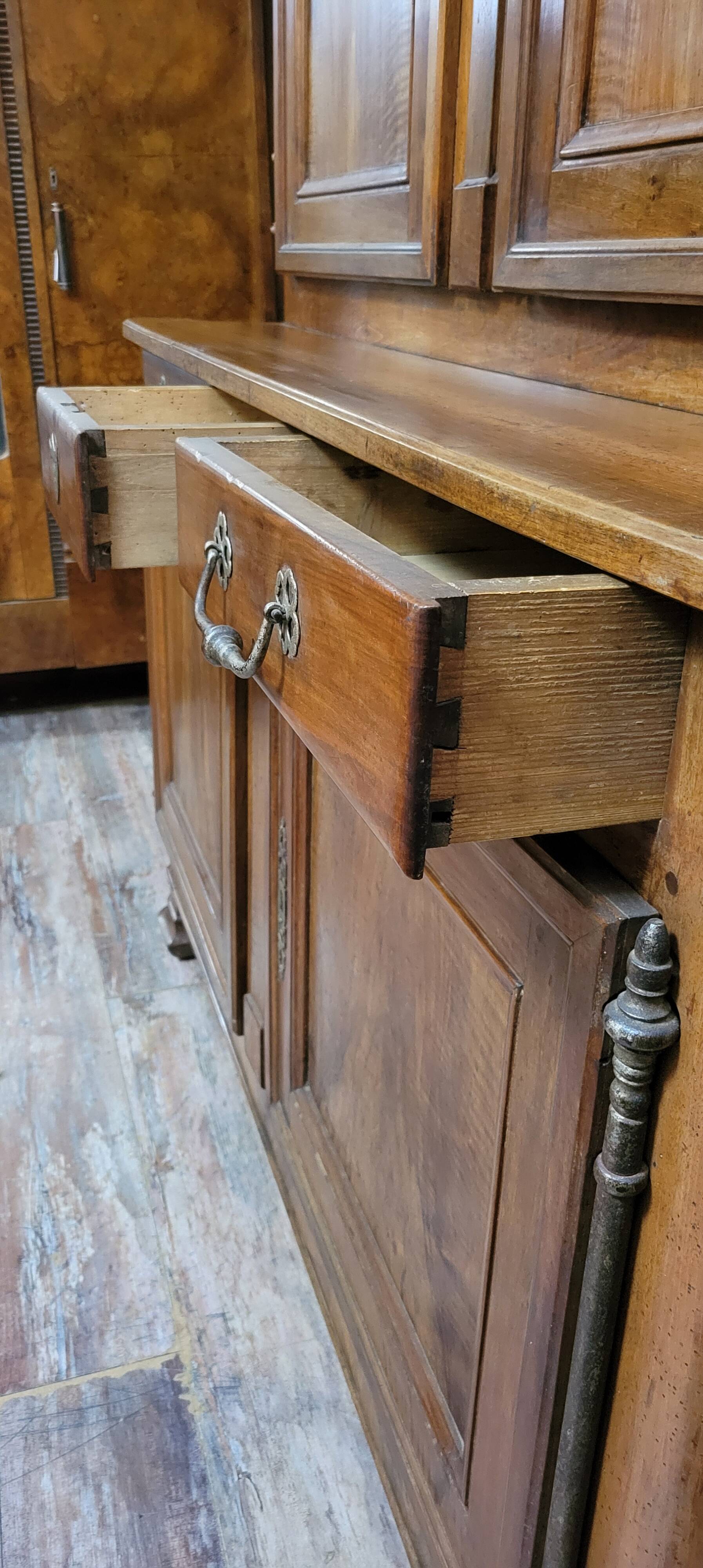 Louis XV period two-part walnut buffet