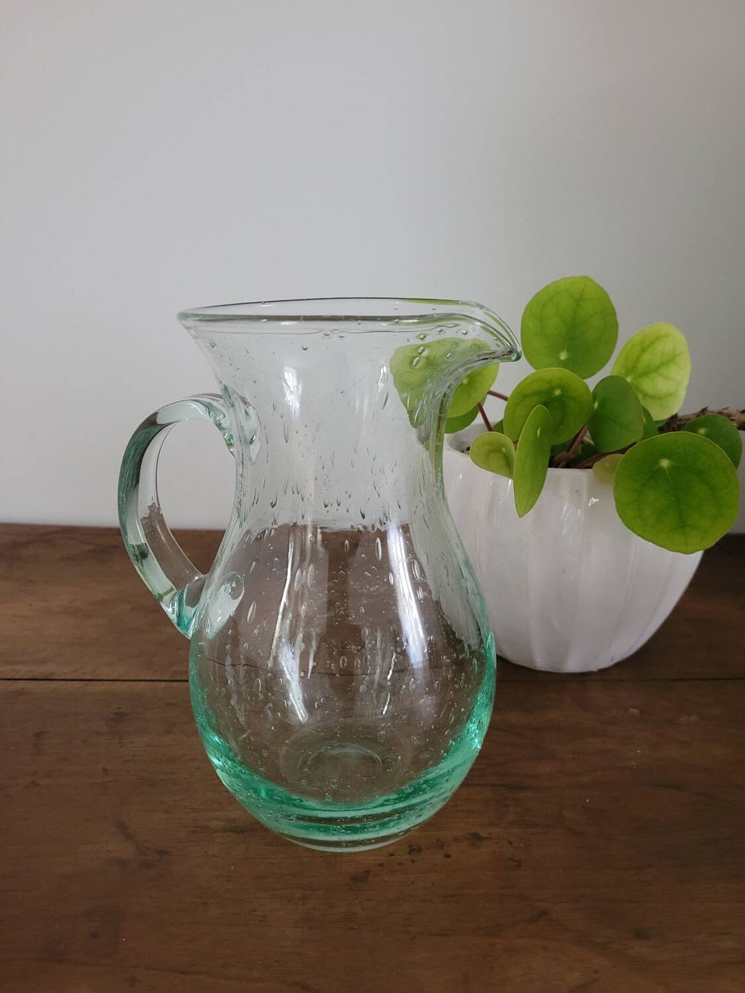 pitcher in green bubbled glass
