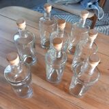 Set of 8 glass bottles with corks
