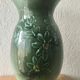 Green ceramic vase