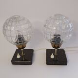 A pair of bedside lamps