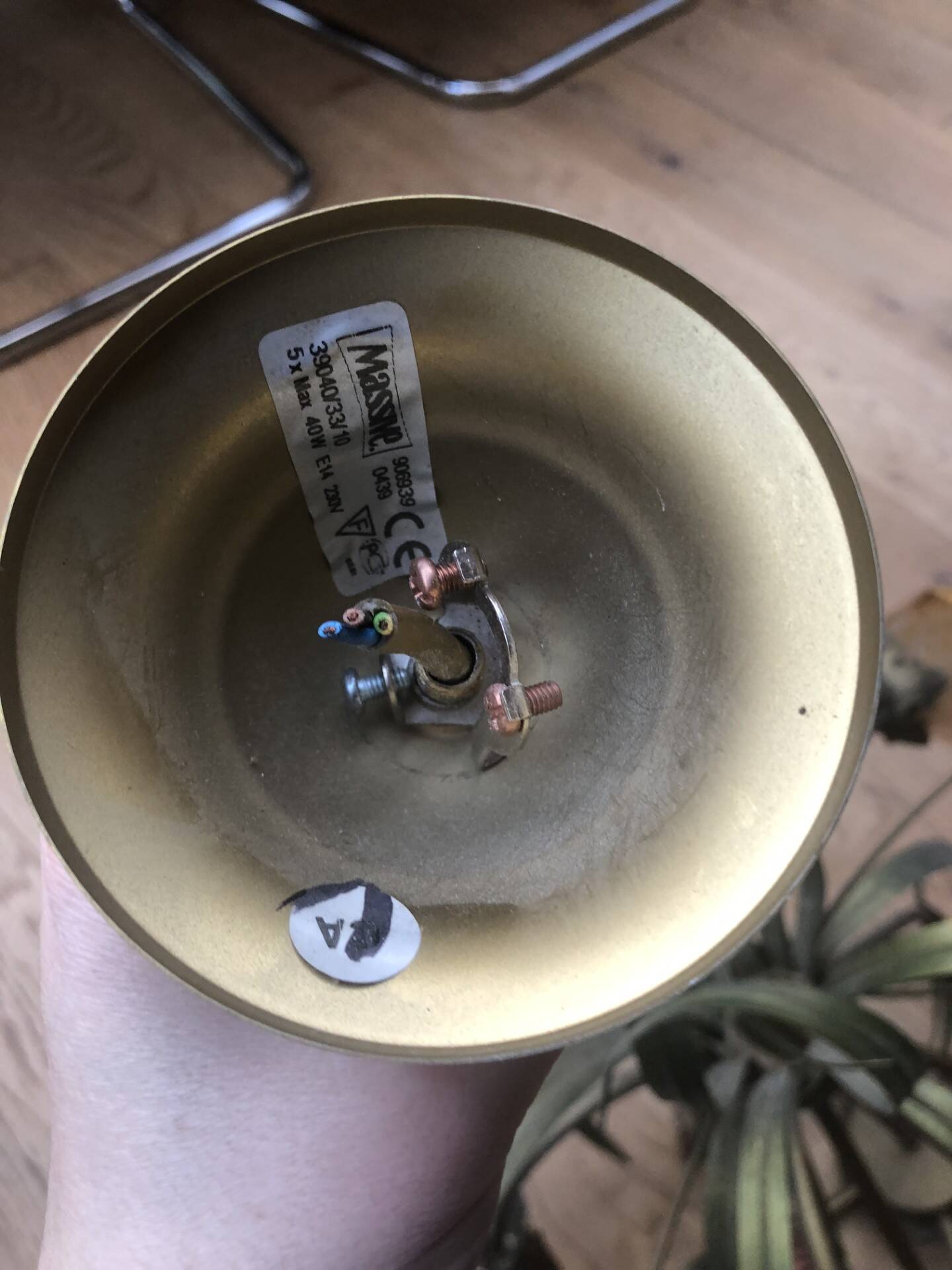 Antique Art Deco metal chandelier with a tinted glass shade.