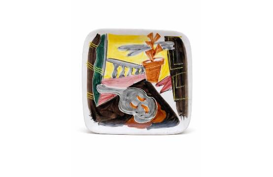 Decorative ceramic plate with enamel decoration