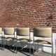 Set of 4 vintage chairs in chrome and faux leather.