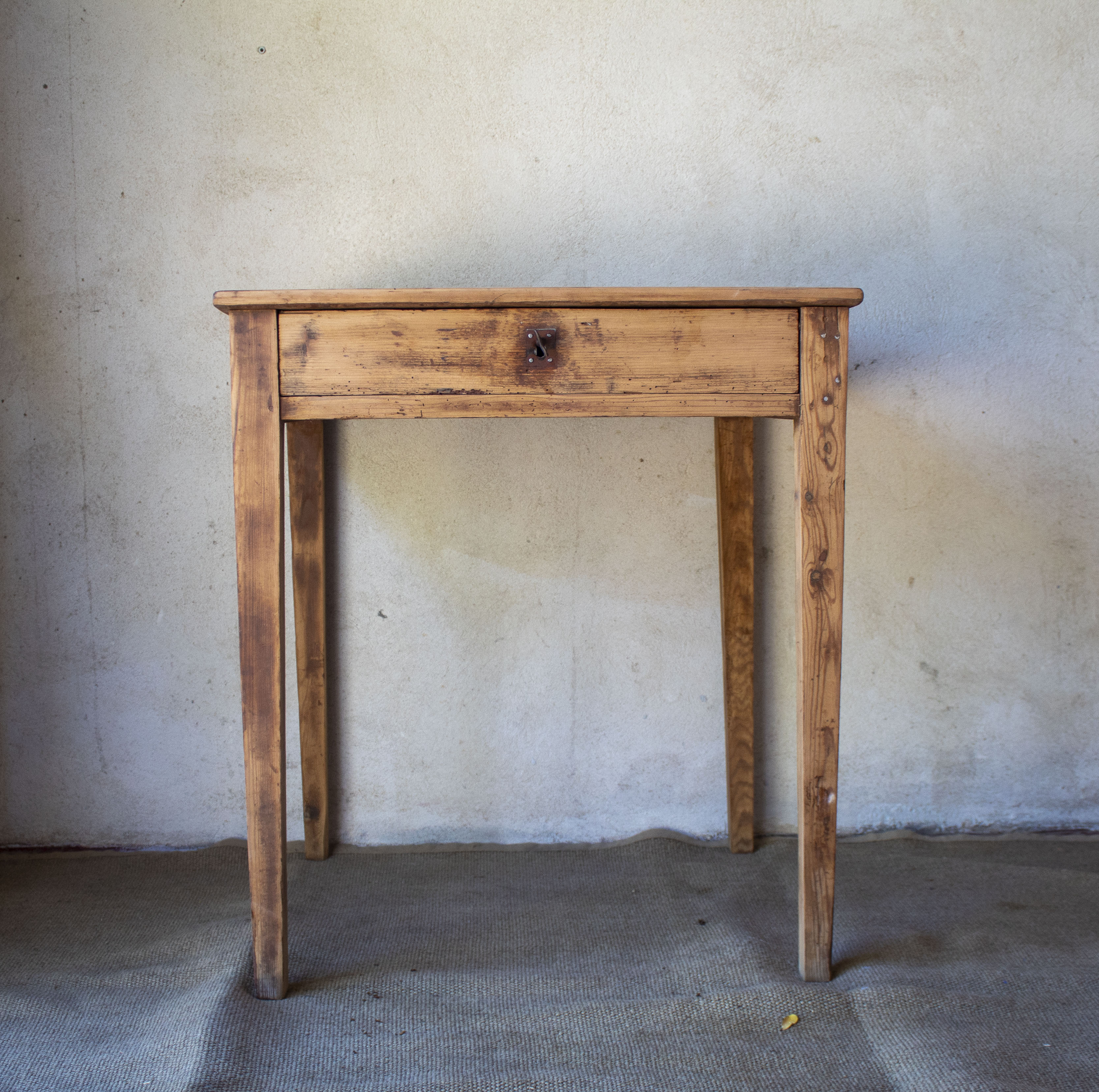 Small vintage desk made of solid wood.