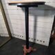 Bistro standing table with marble top and cast iron base.
