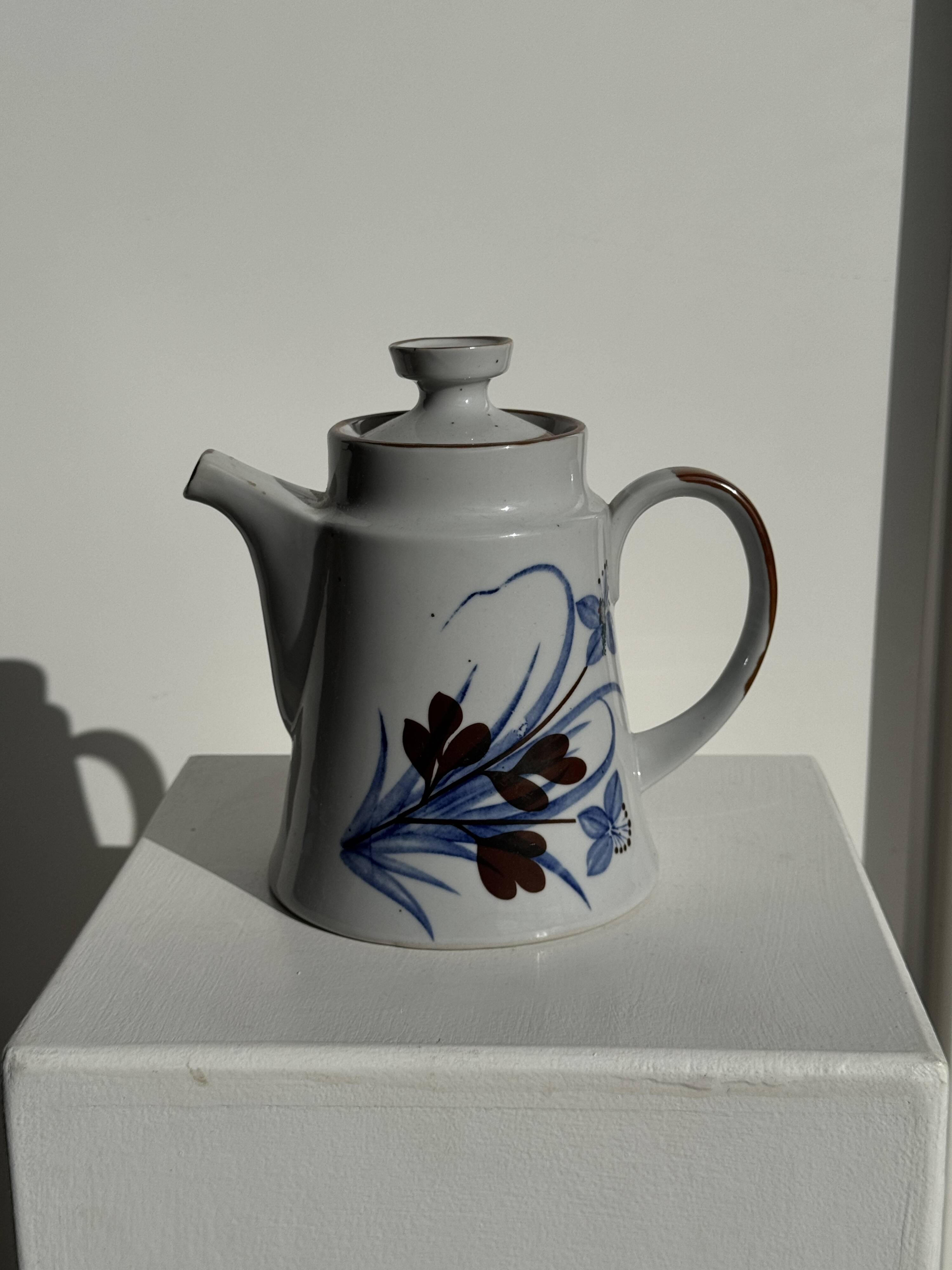 Teapot with stylised blue and brown flowers H18