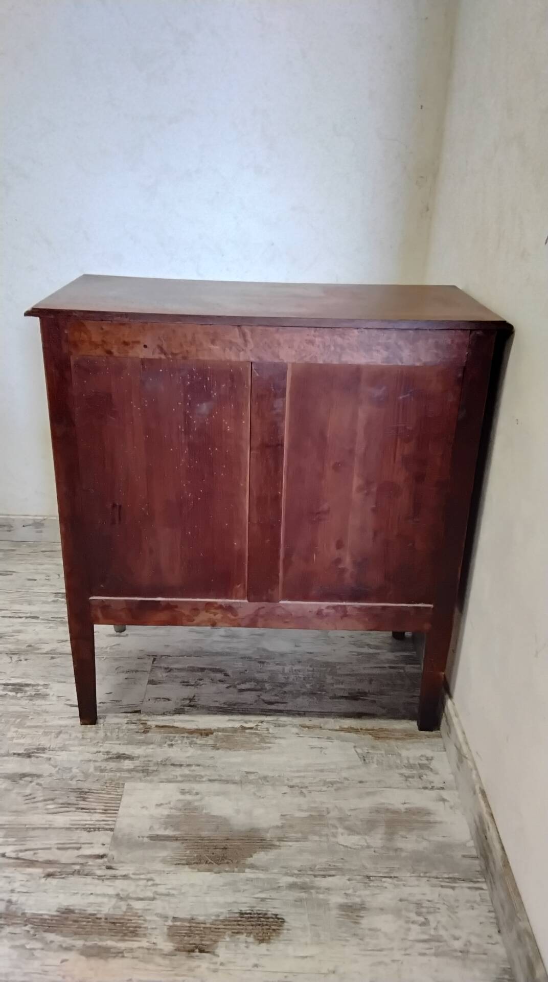 Antique marquetry commode in the Louis XVI style.