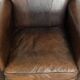 Characterful set of two sheepskin design armchairs with beautiful patina
