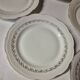 Set of 7 fine porcelain dessert plates with gilding, SFP, French company