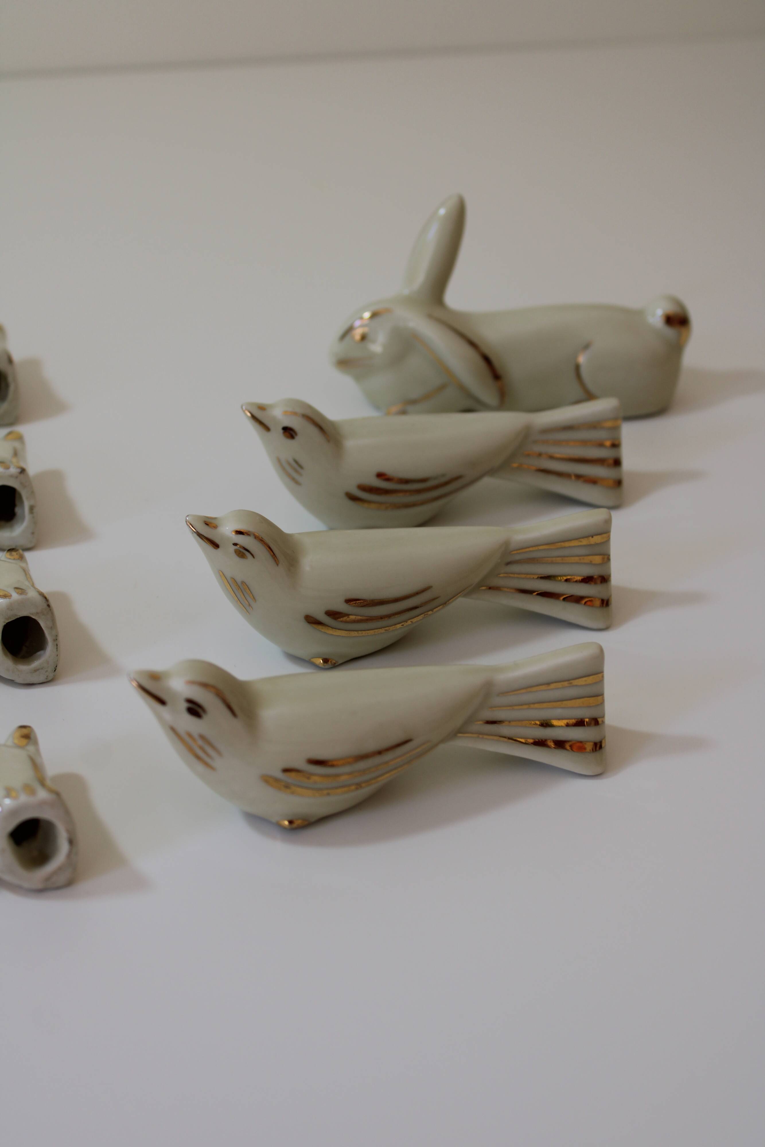 8 portes couteaux animaux porcelaine de Limoges vintage