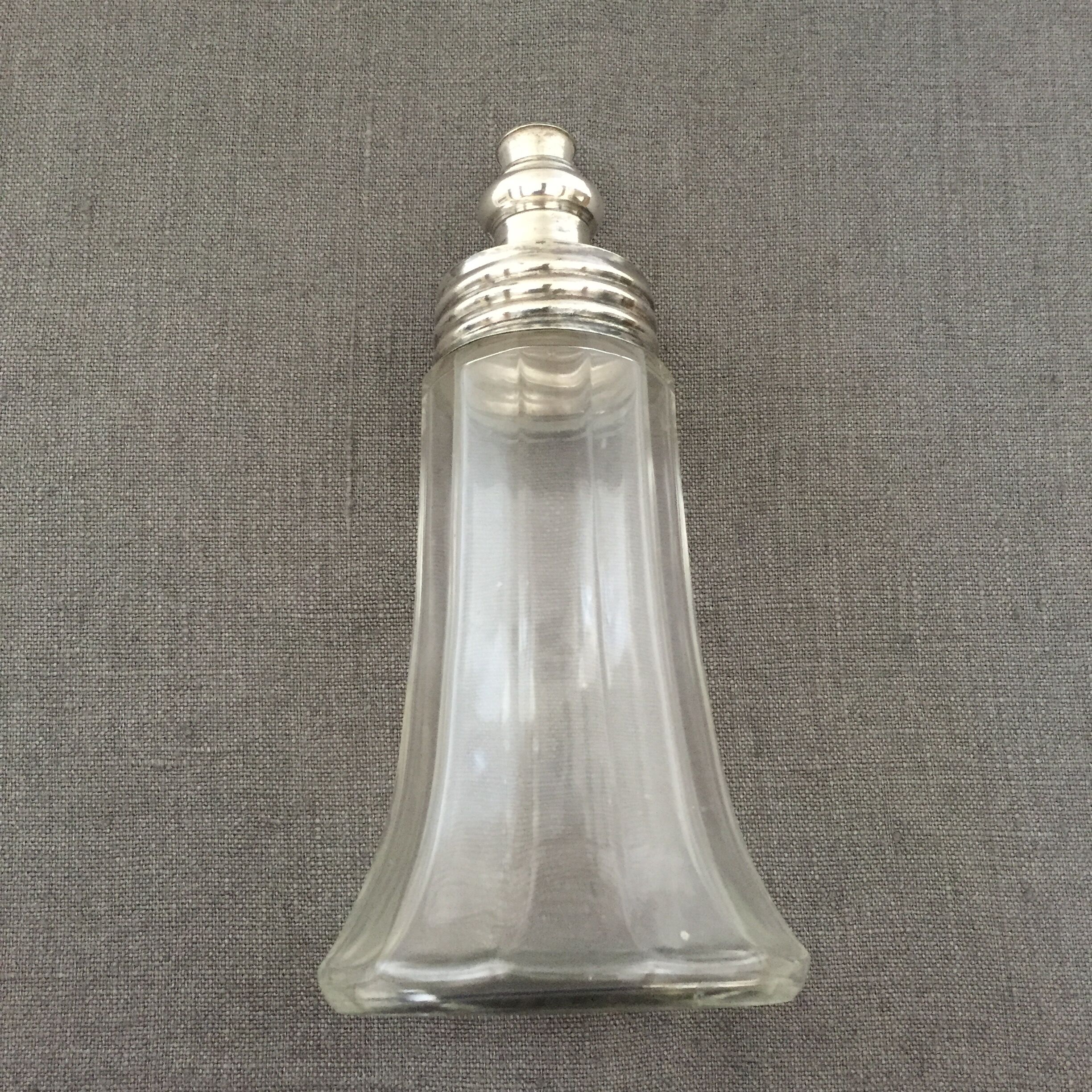 Glass sugar sprinkler and silver metal