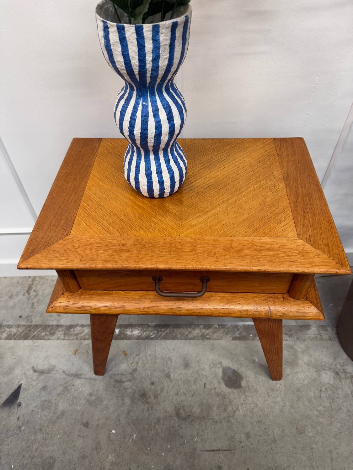 Bedside table with compass feet