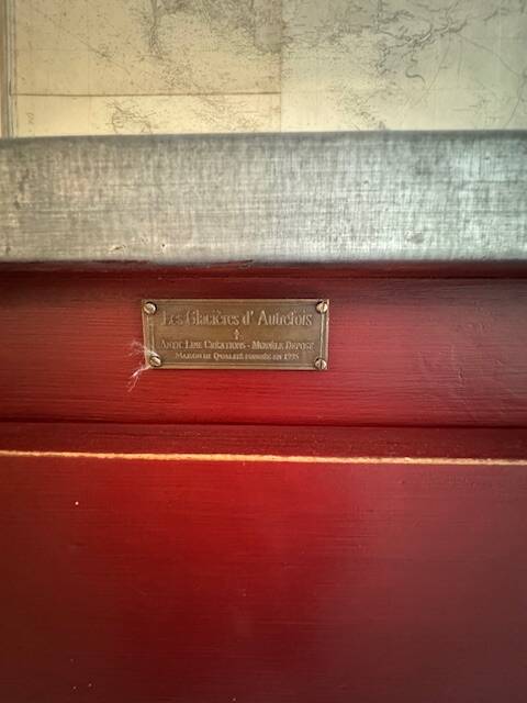 Low red "Guérande" buffet, zinc top, butcher's fridge-style doors