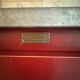Low red "Guérande" buffet, zinc top, butcher's fridge-style doors