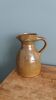 Rustic stoneware jug, chic countryside.